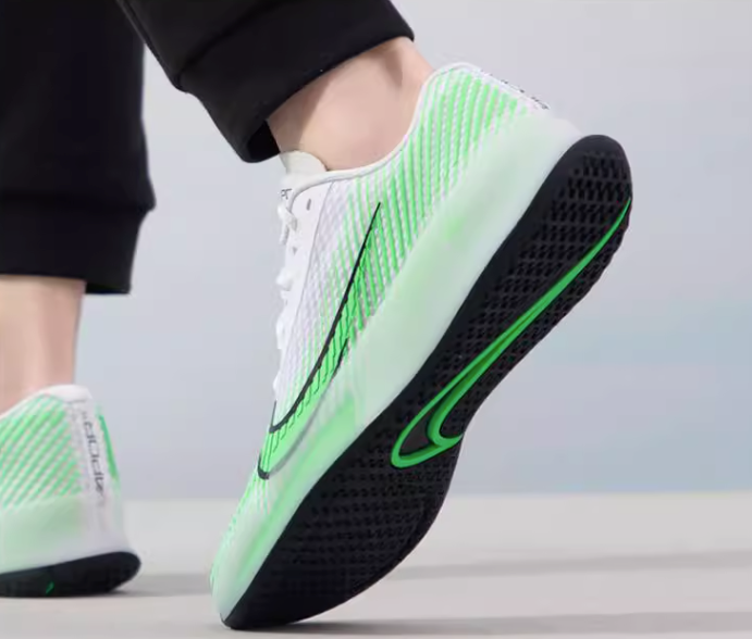 Nike green tennis shoes sales